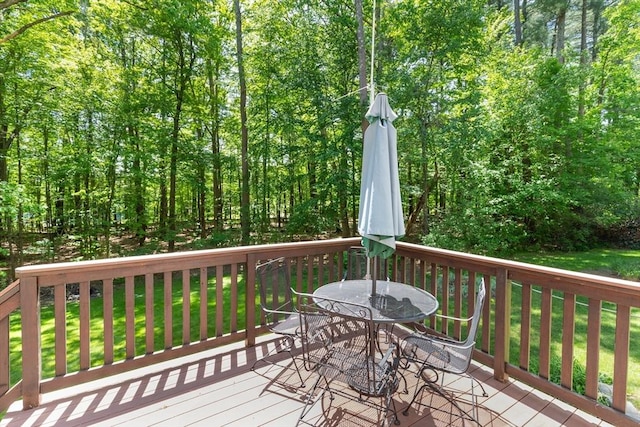 12 Robin Ln, Pepperell, MA 01463 - deck featuring outdoor dining area and a yard