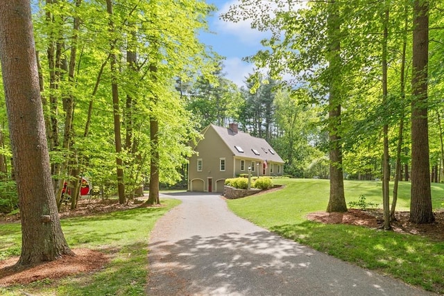 12 Robin Ln, Pepperell, MA 01463 - view of front facade featuring asphalt driveway, a chimney, and a front lawn