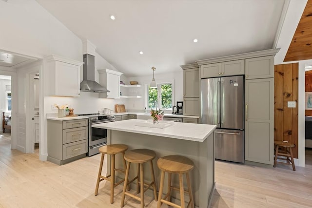 20 Judys Ln, Chatham, MA 02633 - kitchen with appliances with stainless steel finishes, wall chimney exhaust hood, open shelves, gray cabinetry, and vaulted ceiling