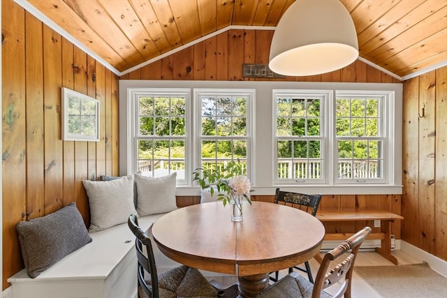 20 Judys Ln, Chatham, MA 02633 - dining room featuring vaulted ceiling, wooden walls, healthy amount of natural light, wooden ceiling, and light wood-style floors
