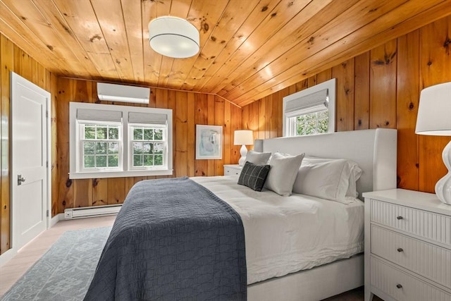 20 Judys Ln, Chatham, MA 02633 - bedroom with a wall unit AC, baseboard heating, wooden walls, wood ceiling, and wood finished floors