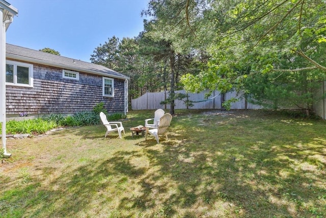 20 Judys Ln, Chatham, MA 02633 - view of yard with an outdoor fire pit