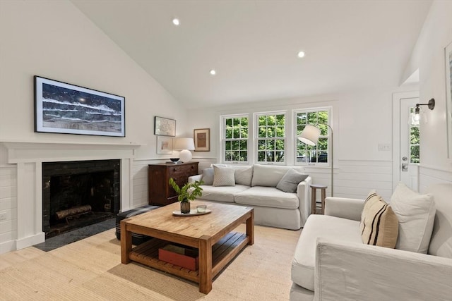 20 Judys Ln, Chatham, MA 02633 - living room with light wood-type flooring, recessed lighting, a fireplace with flush hearth, and high vaulted ceiling