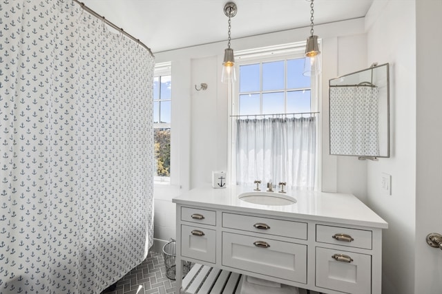 bathroom featuring tile floors and vanity