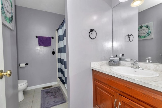 full bathroom featuring tile patterned floors, vanity, toilet, and curtained shower