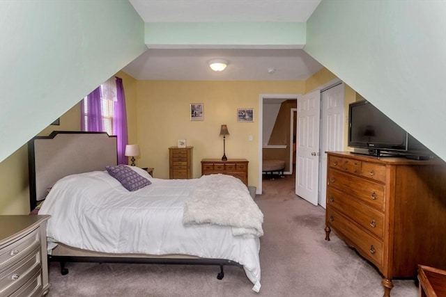 bedroom with light colored carpet