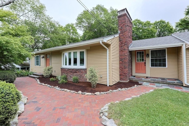 134 W Bacon St, Plainville, MA 02762 - ranch-style home featuring a chimney