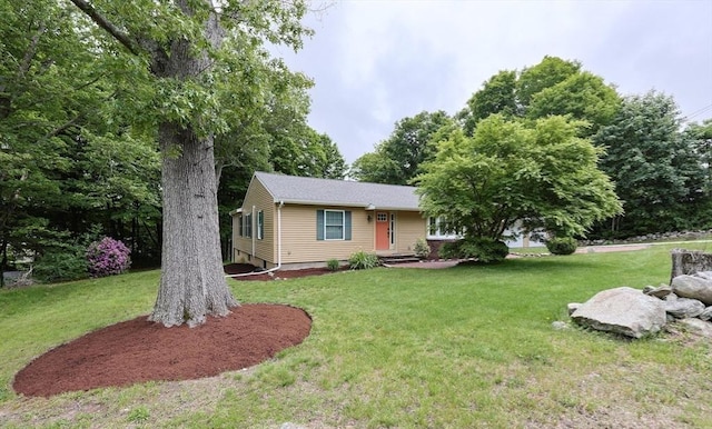 134 W Bacon St, Plainville, MA 02762 - view of front of home with a front lawn