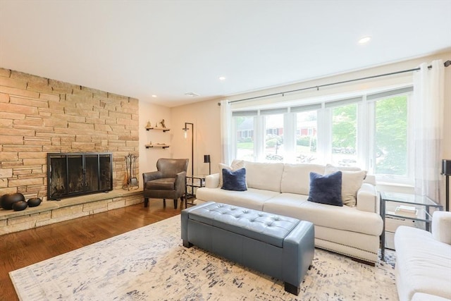 134 W Bacon St, Plainville, MA 02762 - living area with wood finished floors, a fireplace, and recessed lighting