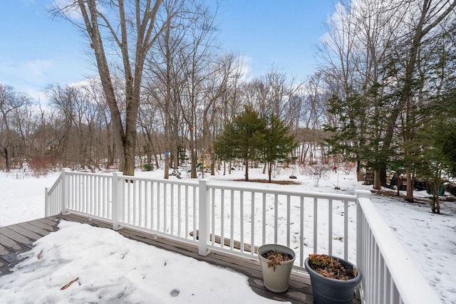 view of snow covered deck