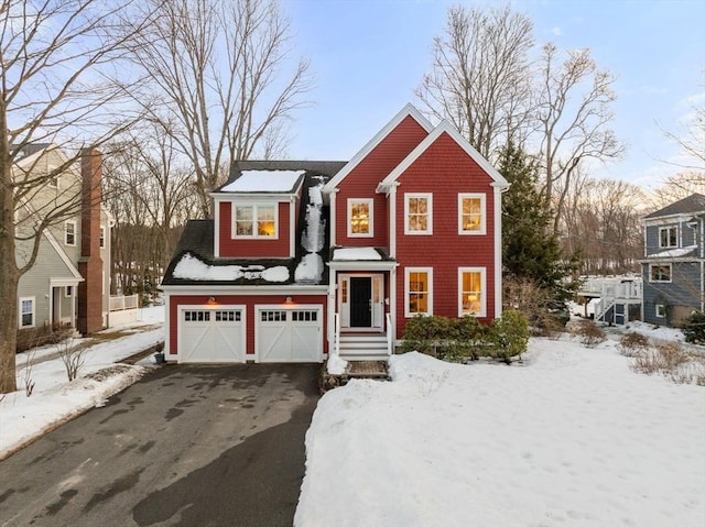 view of front of home featuring driveway and an attached garage