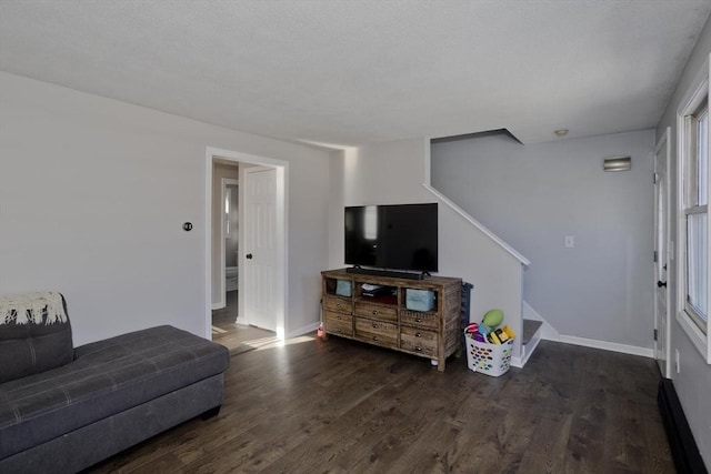 living room with dark wood-type flooring