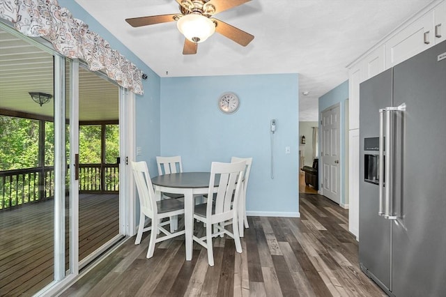 218 Acropolis Rd, Lowell, MA 01854 - dining room featuring dark wood-style floors, ceiling fan, and baseboards