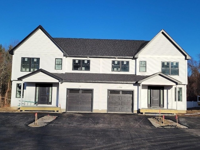 modern farmhouse style home featuring a garage