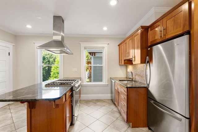 21 Searle Ave Unit 2, Brookline, MA 02445 - kitchen featuring stainless steel appliances, island exhaust hood, a sink, brown cabinets, and a kitchen bar