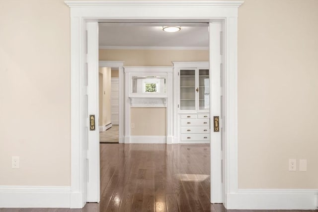 21 Searle Ave Unit 2, Brookline, MA 02445 - corridor featuring wood finished floors, ornamental molding, baseboards, and baseboard heating
