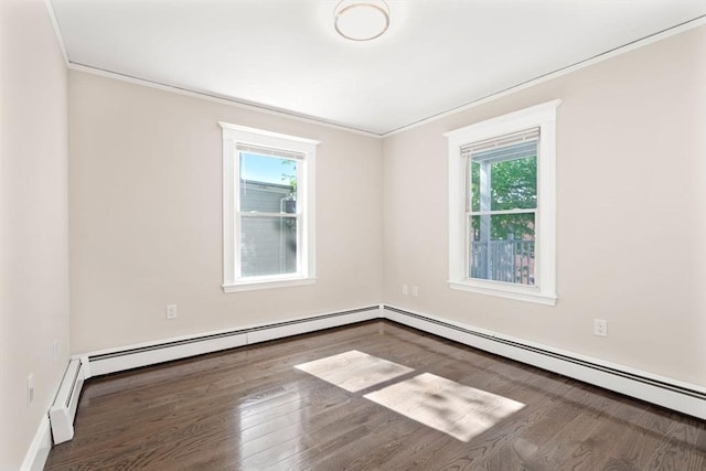 21 Searle Ave Unit 2, Brookline, MA 02445 - unfurnished room featuring ornamental molding, wood finished floors, and baseboard heating