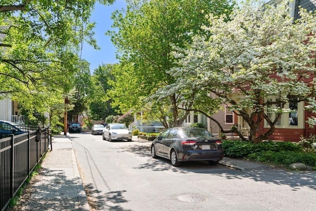 21 Searle Ave Unit 2, Brookline, MA 02445 - view of asphalt street featuring sidewalks and curbs