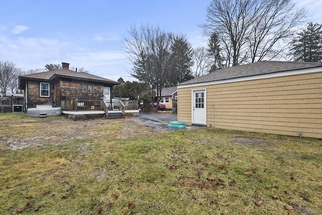 view of yard featuring a wooden deck