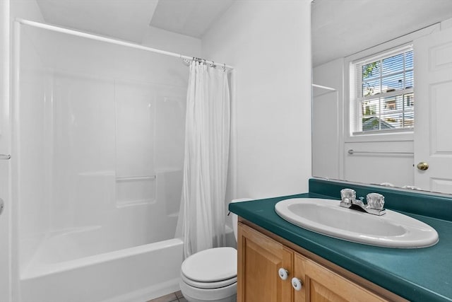 bathroom with vanity, toilet, and shower / bath combination with curtain