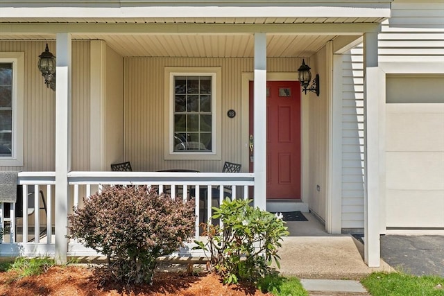 doorway to property with a porch