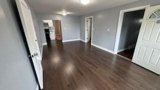 15 York St, Haverhill, MA 01830 - empty room with dark wood-type flooring and baseboards
