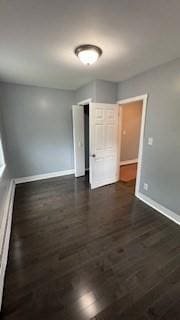 15 York St, Haverhill, MA 01830 - empty room with baseboards and dark wood-type flooring