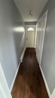 15 York St, Haverhill, MA 01830 - corridor featuring dark wood-type flooring and baseboards