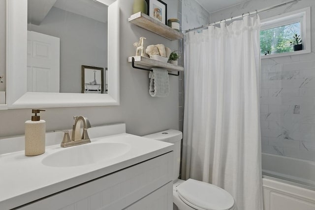 13 Kingston St, North Reading, MA 01864 - bathroom featuring toilet, vanity, and shower / tub combo
