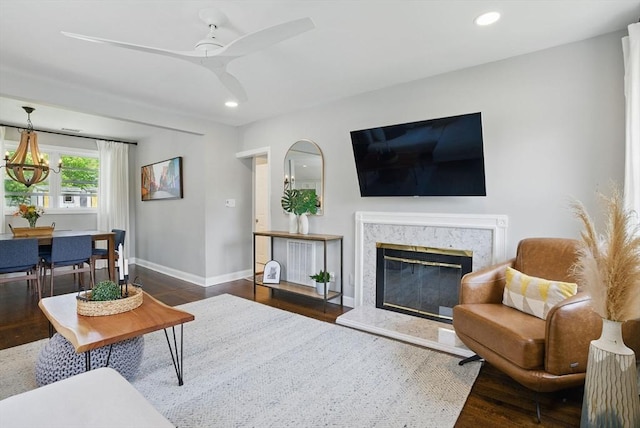 13 Kingston St, North Reading, MA 01864 - living room featuring wood finished floors, baseboards, recessed lighting, a fireplace, and ceiling fan