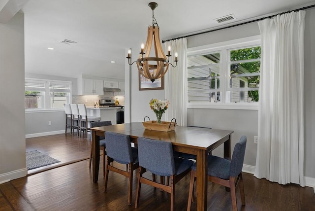 13 Kingston St, North Reading, MA 01864 - dining room featuring a chandelier, baseboards, dark wood finished floors, and recessed lighting