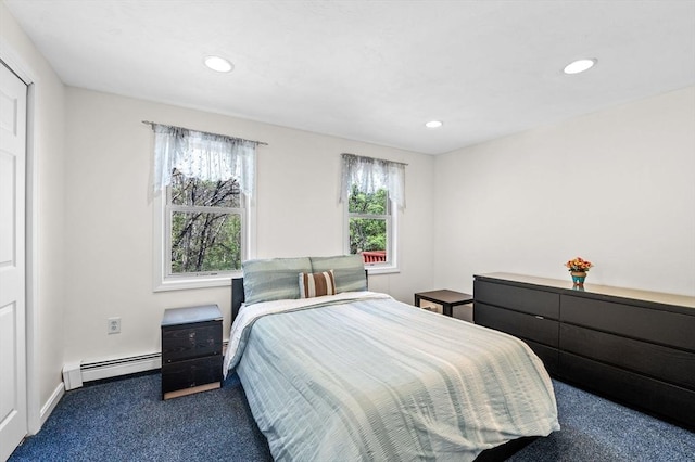 carpeted bedroom with baseboards, a baseboard heating unit, and recessed lighting