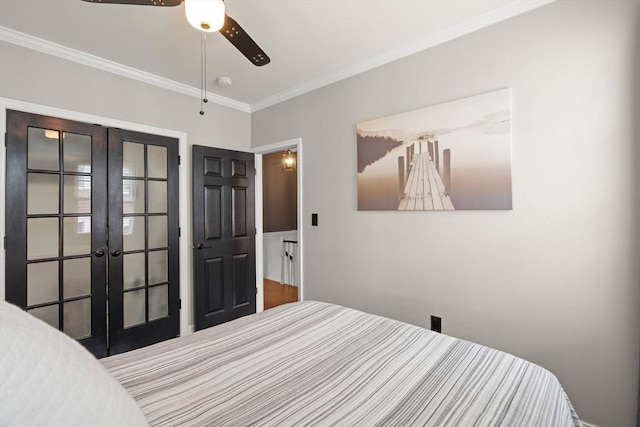 114 Tudor St, Boston, MA 02127 - bedroom with french doors, crown molding, and a ceiling fan