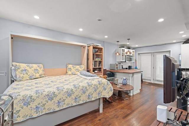 114 Tudor St, Boston, MA 02127 - bedroom with wood finished floors and recessed lighting