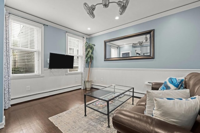 114 Tudor St, Boston, MA 02127 - living area featuring baseboard heating, ornamental molding, wainscoting, wood finished floors, and recessed lighting