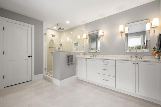 bathroom featuring vanity and walk in shower