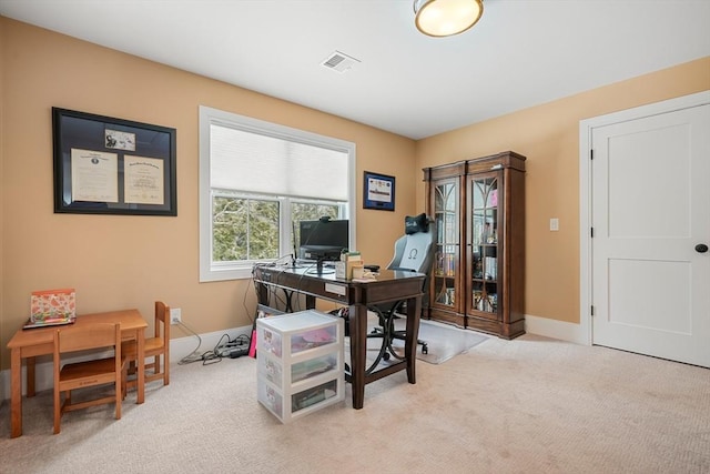 home office featuring light colored carpet