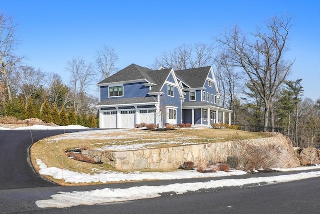 view of front of property with a garage