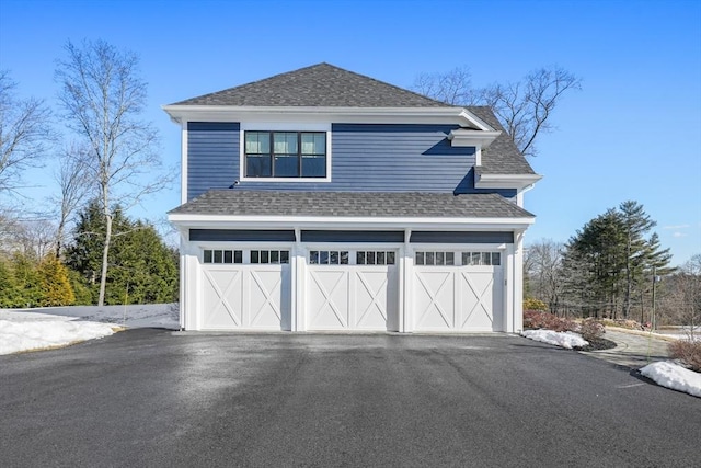 exterior space featuring a garage