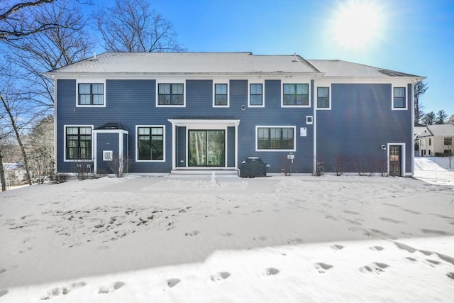 view of snow covered property