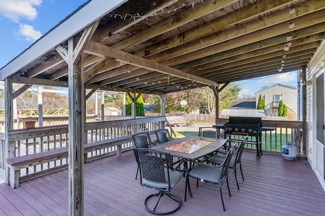 wooden deck featuring grilling area