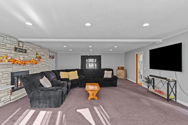 living room featuring a textured ceiling, a fireplace, dark carpet, and beam ceiling