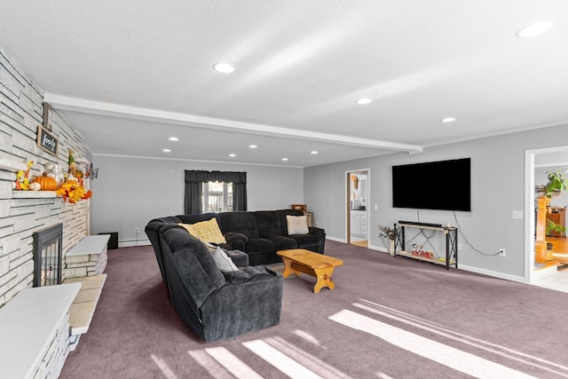 living room with dark colored carpet, a stone fireplace, crown molding, and a textured ceiling