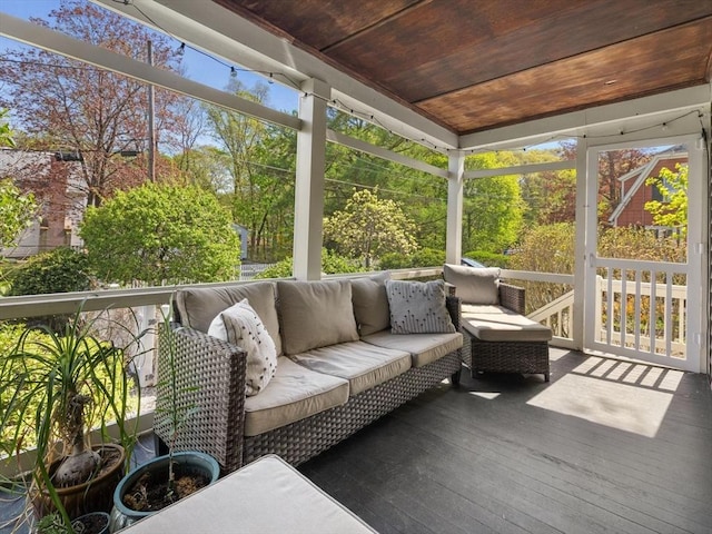 sunroom / solarium with an outdoor living space
