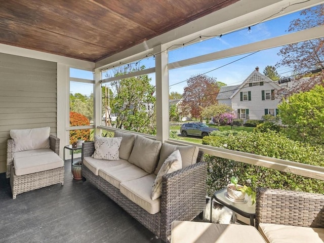 sunroom with an outdoor hangout area