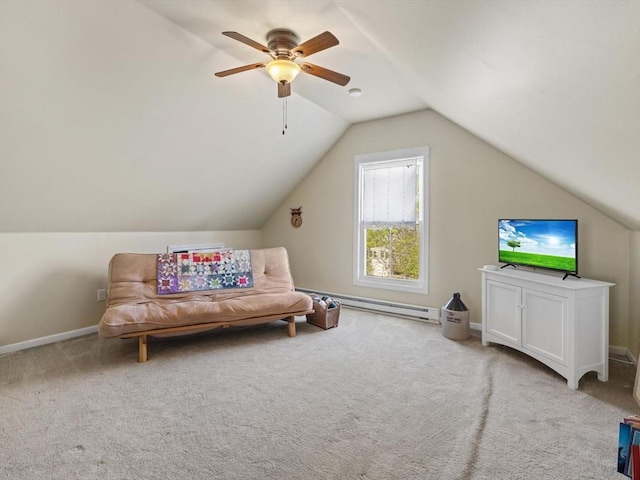 living area featuring a ceiling fan, baseboards, lofted ceiling, and carpet