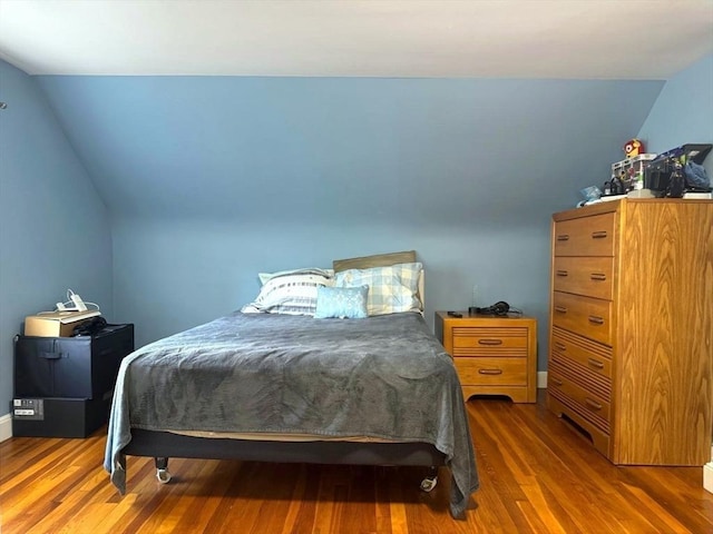 103 Sycamore St, Holbrook, MA 02343 - bedroom featuring lofted ceiling, wood finished floors, and baseboards