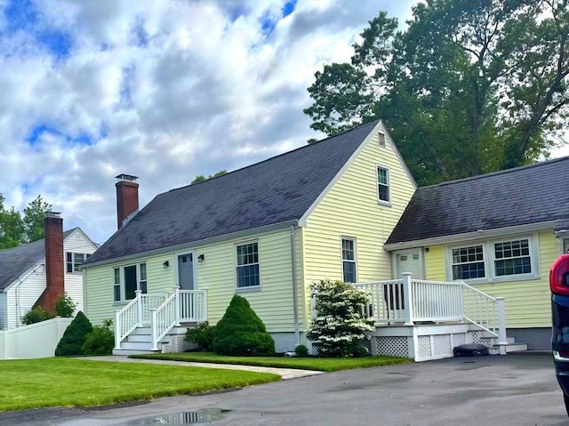 103 Sycamore St, Holbrook, MA 02343 - cape cod house featuring a chimney