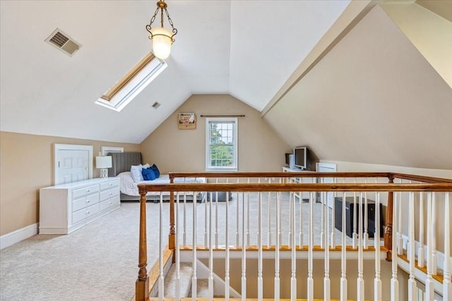 bonus room with baseboards, lofted ceiling, visible vents, and carpet floors