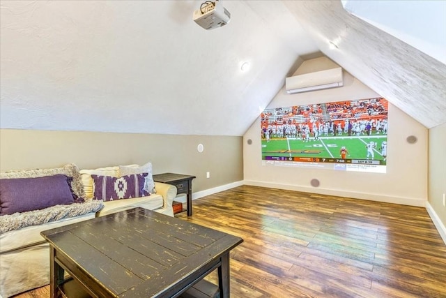 interior space featuring wood-type flooring, baseboards, vaulted ceiling, and a wall unit AC